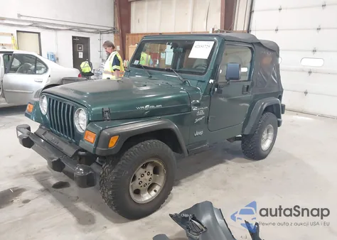 2000 Jeep Wrangler Sport z USA, uszkodzony, nr VIN 1J4FA49S2YP712526